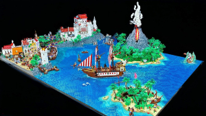 An elaborate $30,000 LEGO pirate world model featuring a volcanic island, pirate ships, a coastal village, and lush greenery surrounded by a vibrant blue ocean.